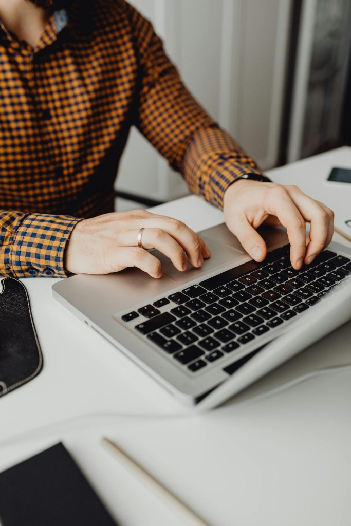 Freelancer improving skills through online work and study, emphasizing continual learning and upskilling.