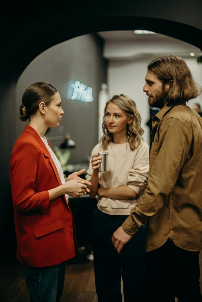 Freelancers networking and building client relationships through real-world conversations and referrals.