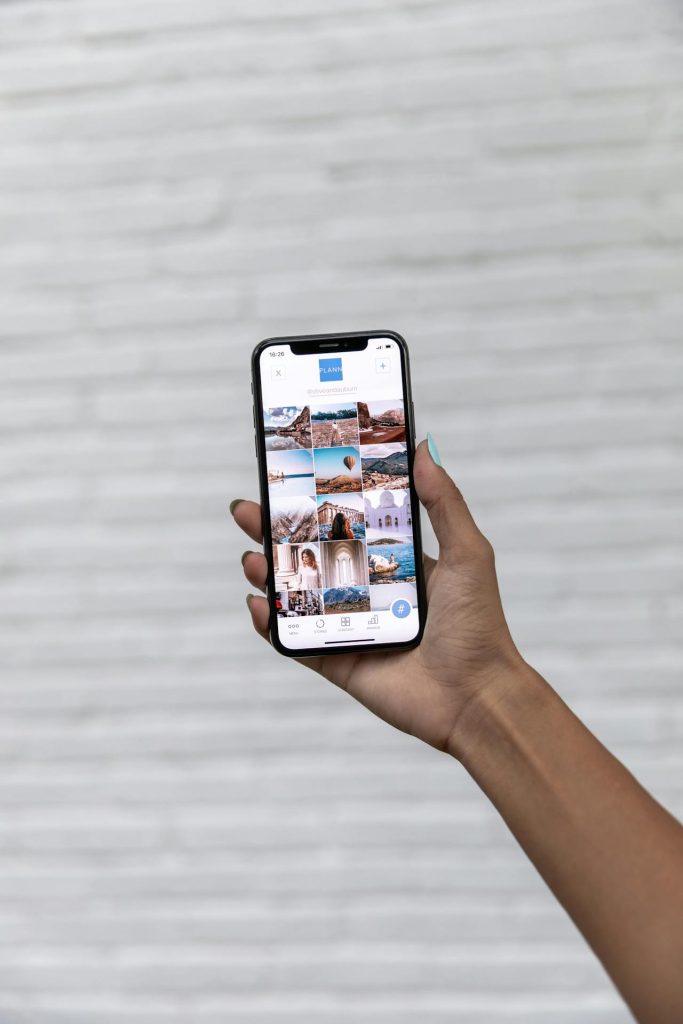 Freelancer showcasing their portfolio or content on Instagram, representing how to use social media to attract freelance clients.